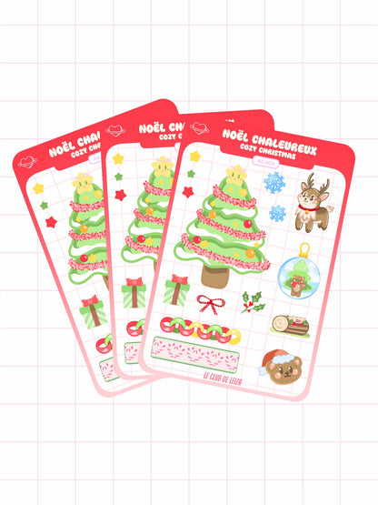 Set of Christmas-themed sticker sheets on a grid background