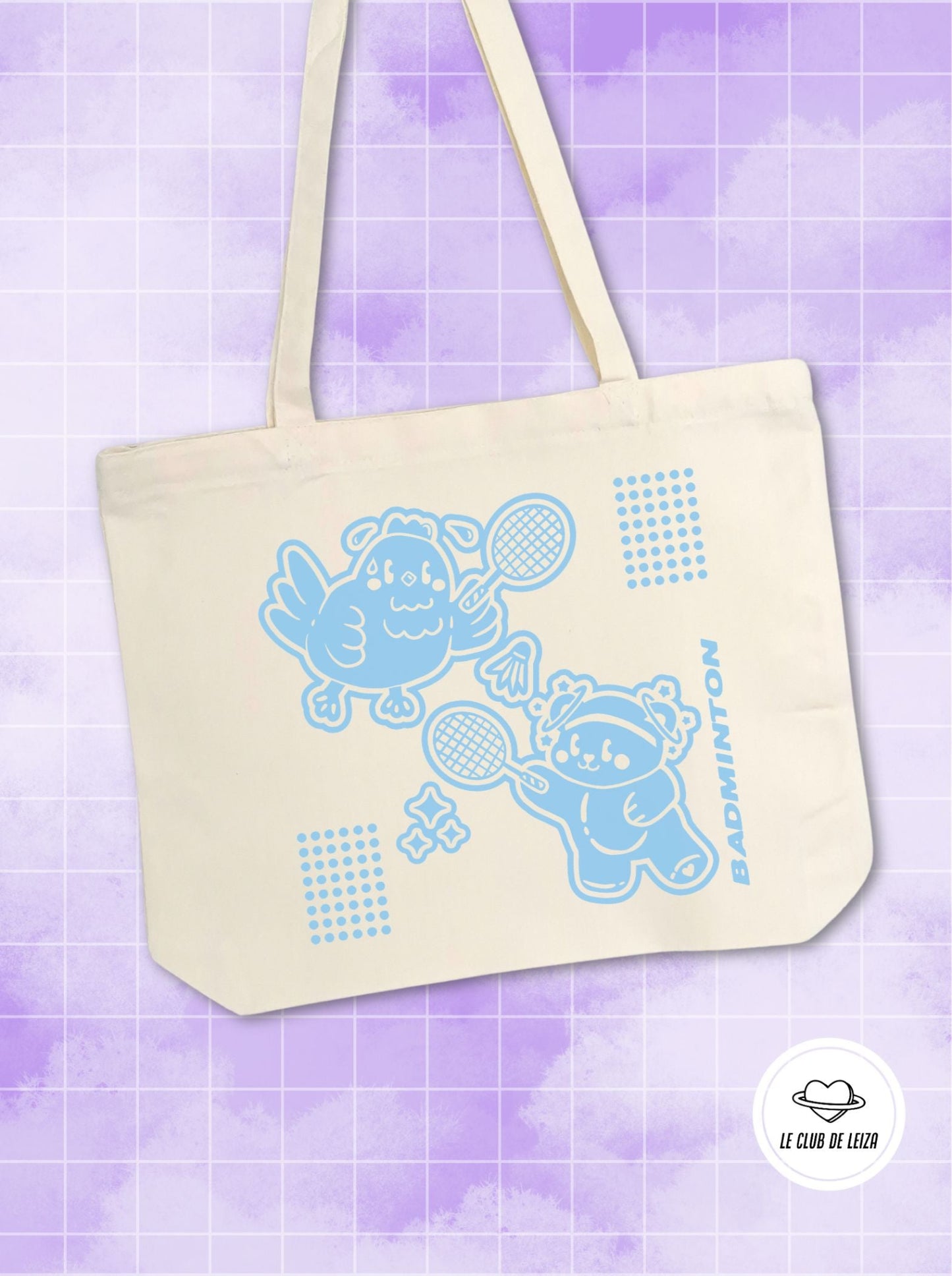 Beige tote bag with blue cartoon characters and patterns on a purple background