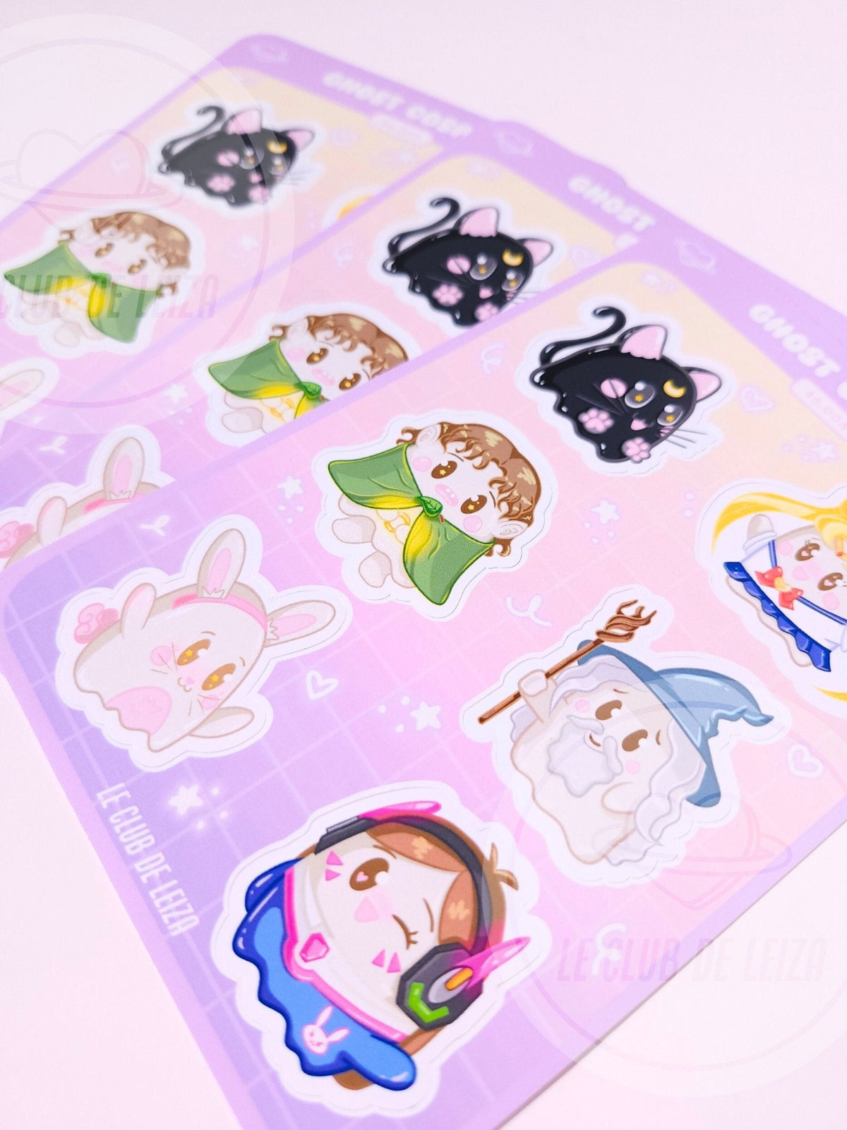 Sticker sheet with cartoon characters on a pink purple background