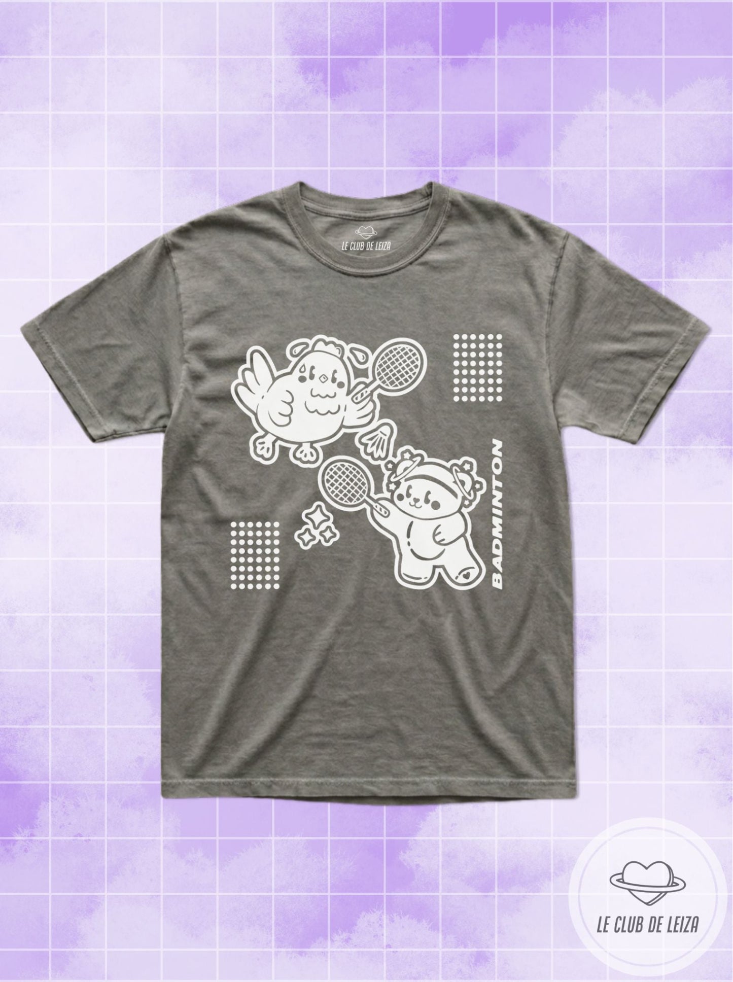 Gray t-shirt with white graphic design on a purple grid background