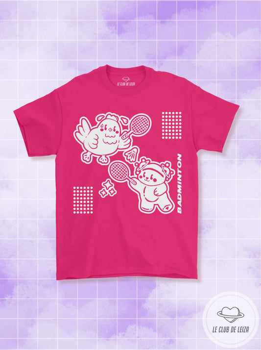 Pink t-shirt with white graphic design on a purple grid background