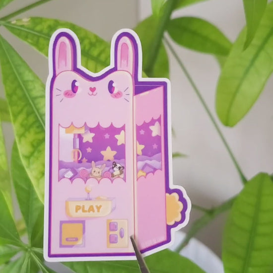 Kawaii bunny claw machine vinyl sticker, cute gaming design for laptop decoration