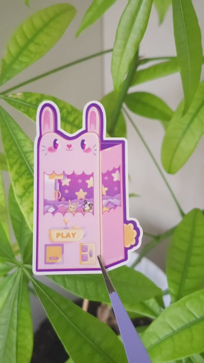 Kawaii bunny claw machine vinyl sticker, cute gaming design for laptop decoration